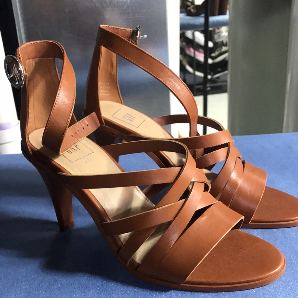 Brand new. Never worn. High heel sandals.